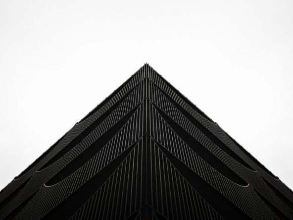 a black and white photo of the top of a building